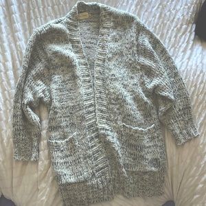 Grey knit cardigan. From Daily Loom box